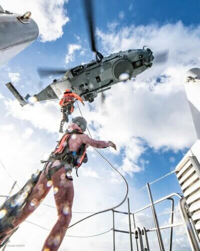 Rescue workers on a longline. Tagged on Instagram by @charles_marion_photographe