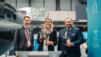 Jacinto Monge (left) celebrates the announcement of an order at European Rotors in Madrid, Spain. Bell Photo