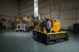 The GE T901 engines are unboxed during a ceremony at Sikorsky's West Palm Beach facility on June 27. GE Photo