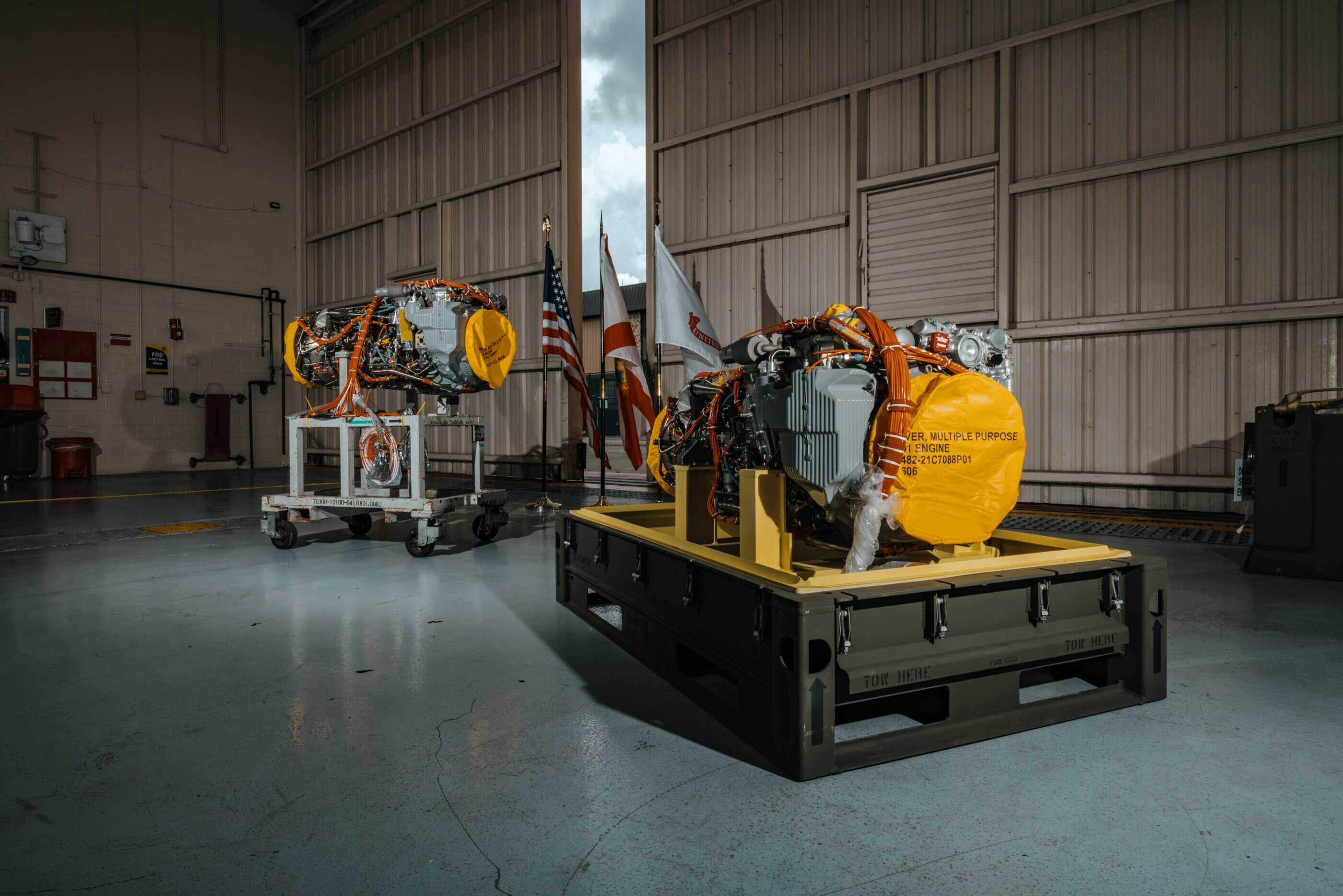The GE T901 engines are unboxed during a ceremony at Sikorsky's West Palm Beach facility on June 27. GE Photo