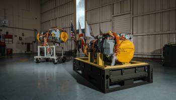 The GE T901 engines are unboxed during a ceremony at Sikorsky's West Palm Beach facility on June 27. GE Photo